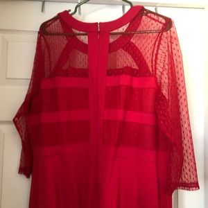 Red quarter-sleeve dress.